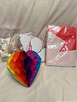 Flag package, honeycomb decoration, bags of pins together