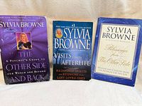 Front covers of all three Sylvia Browne afterlife books