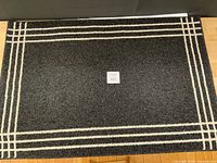 Top view showing full rug and stripe border