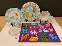 Complete lot showing dish set and wooden puzzle with pieces inserted