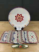 Full set: bowl, eight plates, olive dish