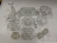All twelve crystal items arranged on white surface