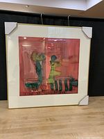 Full frontal view of framed artwork with mat and gold frame