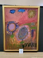 Front view of framed naïf flower painting