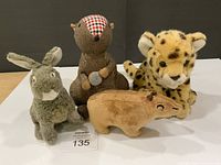 Group shot of four stuffed animals