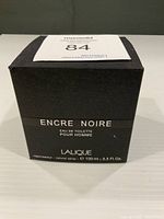 Front of sealed Encre Noire box showing branding and size 100 ml / 3.3 fl oz