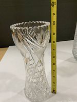 Vase with tape measure indicating height