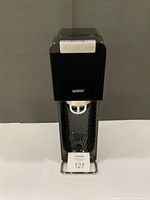 Front view of black SodaStream unit