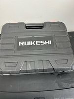 Closed Ruikeshi branded carrying case