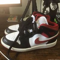 Left shoe side view showing colorway and Swoosh