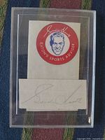Front view of case showing both portrait card and autograph cut