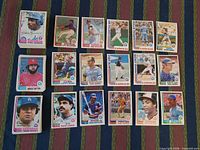 Fronts of 18 sample cards laid out including stars