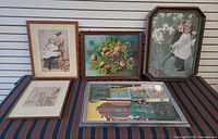 Group shot showing all five framed artworks