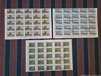 Overview of the three full stamp sheets