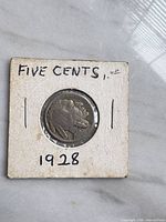 Obverse of 1928-D Buffalo nickel in holder