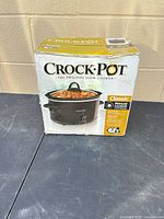 Front view of Crock-Pot Classic 4-quart slow cooker box showing product image and specifications