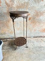 Full view of vintage metal two-tier stand