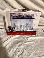 Front of boxed HolidayStuff winter tealight holder