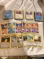 Stacked and spread Pokémon cards showing variety and quantity