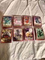 Eight wrapped stacks of MetaZoo Topps Chrome cards front cards visible