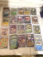 All sleeved Pokémon V/VSTAR/VMAX cards laid out in rows