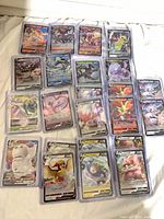 Full layout of 40 sleeved Pokémon V/VMAX/Full Art cards