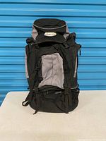 Front view of Eyespy Odyssey 60L black/grey backpack showing overall design and compartments