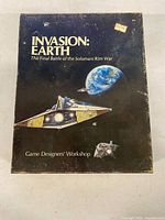 Front of Invasion: Earth box showing cover art and title