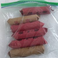 Six coin rolls sealed in a resealable plastic bag