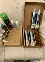 All hair products grouped in two open boxes