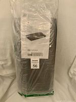 Front view of sealed Umbra UDRY drying rack with mat package