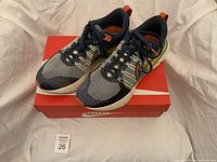 Top view of the pair on original Nike box