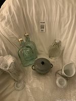 group shot showing all bottles, one fry server, bubble-wrapped second server and soup bowl