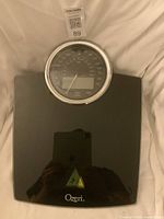 Top view of Ozeri Rev bathroom scale showing dial and platform