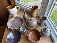 Group shot of all pottery pieces on table