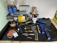 Full lot overview showing painting tools and supplies