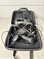 Headset, controller, Lightpack, cables inside case