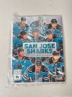 Front view of sealed San Jose Sharks 2011-12 yearbook