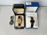 All three Seiko watches with two presentation boxes visible