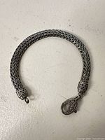 full view of woven sterling bracelet laid flat