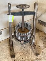 Full view of wine press showing overall structure and size