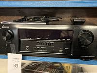 Front view of Denon AVR-S530BT receiver showing display, controls, and volume knob