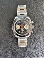 Front view of chronograph watch on bracelet