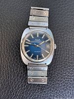 Front view of Avia watch showing blue dial, bracelet, overall design