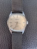 Front view of Cardinal watch showing dial, case, strap