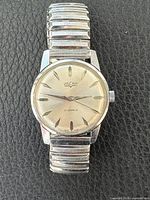 Front view of Vulcain wristwatch on black background