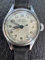 Front view of Girard Perregaux ladies wristwatch showing dial, hands, crystal and strap