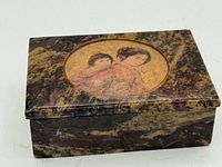 Marble box closed, showing lid artwork