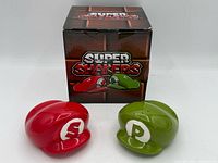 Lot overview with both cap shakers and box