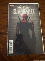 Front cover of Marvel S.H.I.E.L.D. #1 Deadpool variant in bag